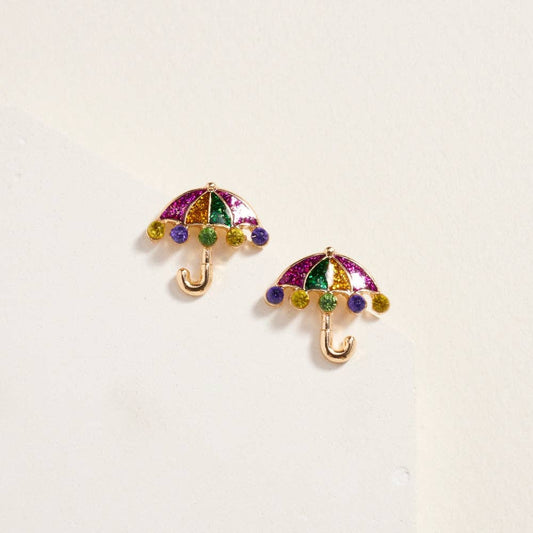 Colorful umbrella-shaped earrings on a light beige background