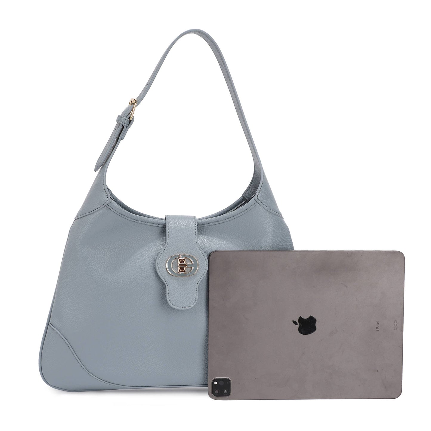 Blue handbag and matching laptop skin on a white background