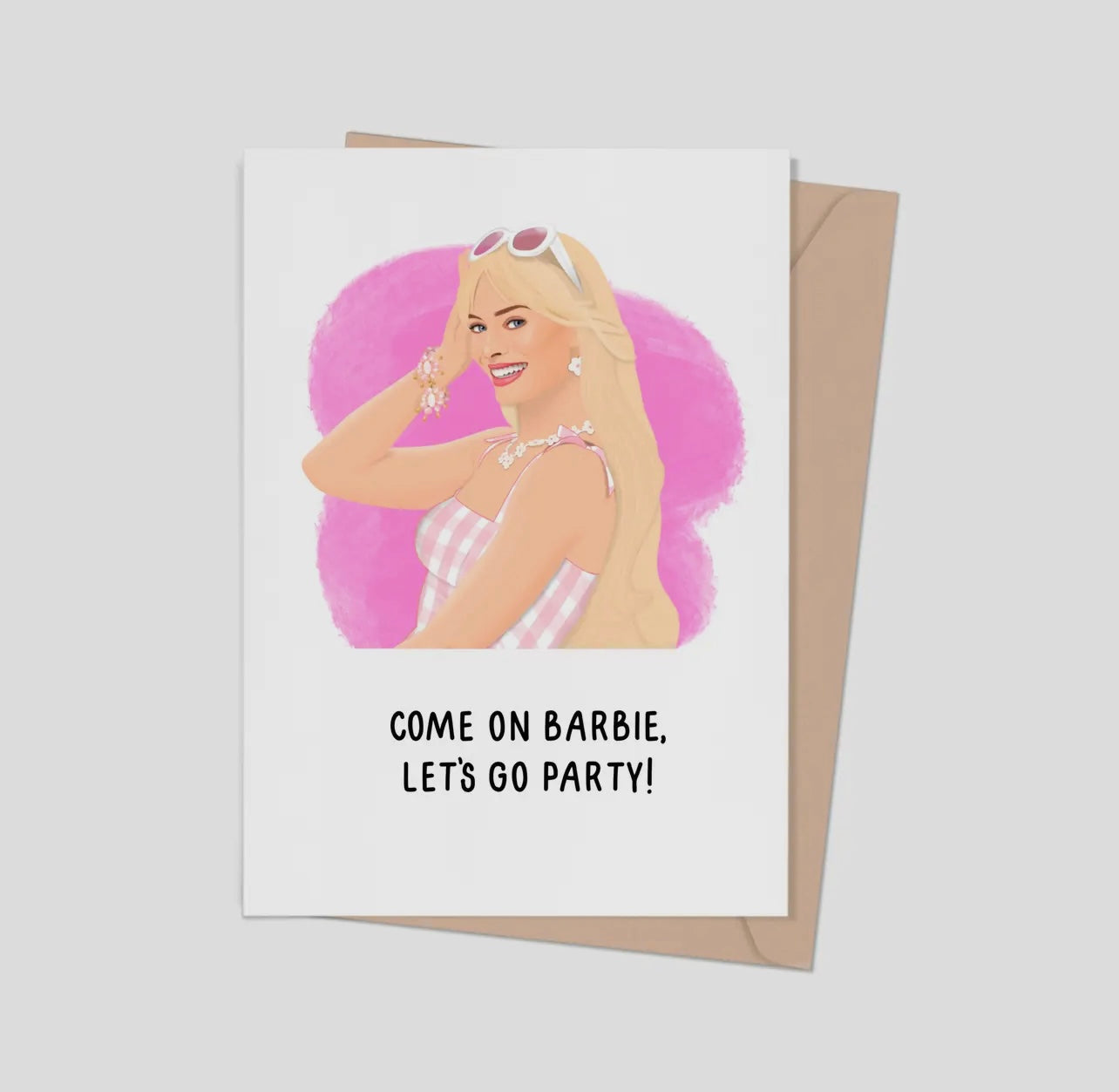 A birthday card featuring an illustration of Barbie with the text 'COME ON BARBIE, LET'S GO PARTY!' printed below.