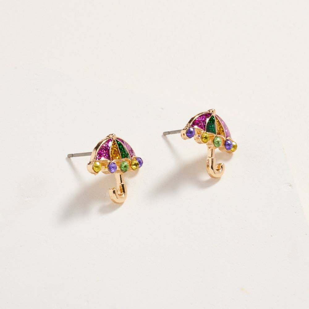 Colorful umbrella-shaped earrings on a light beige background