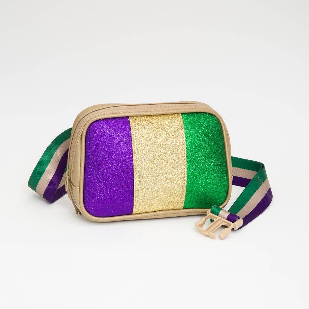 Glittery crossbody bag with purple, gold, and green stripes on a light gray background