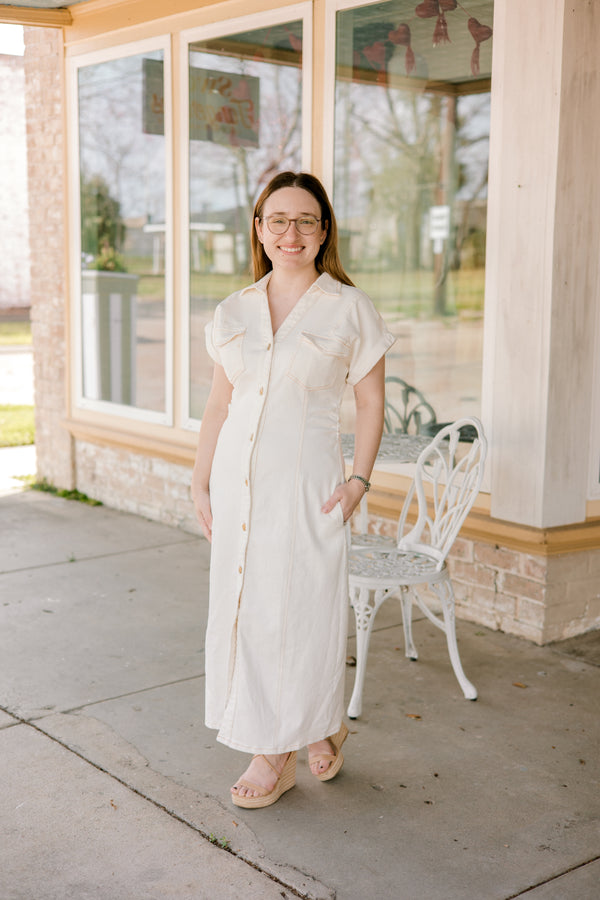 white denim dress with buttons and pockets