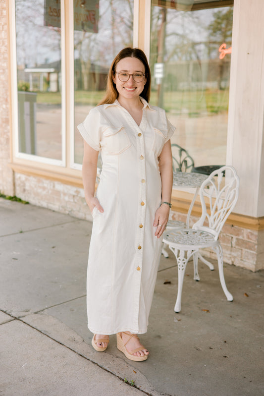white denim dress with buttons and pockets