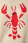 Red lobster design on a beige knitted fabric