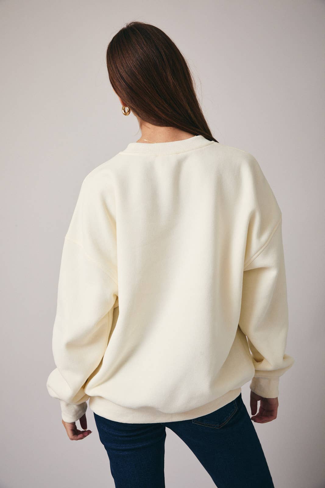 back of Valentines emboridered sweatshirt, plain cream.