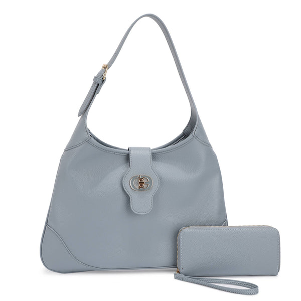 Blue handbag with matching wallet on a white background